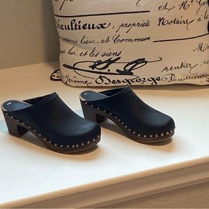 Sanitas black leather studded clogs